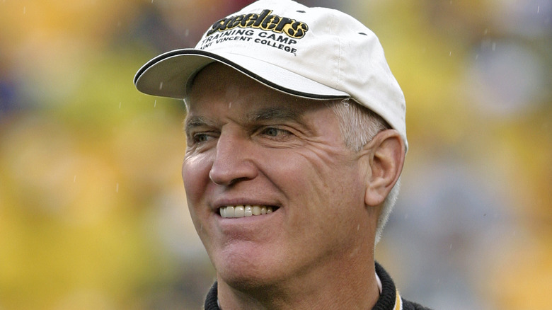 andy russell smiling steelers cap