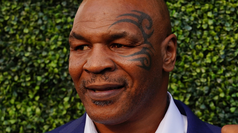 Mike Tyson posing with raised fist