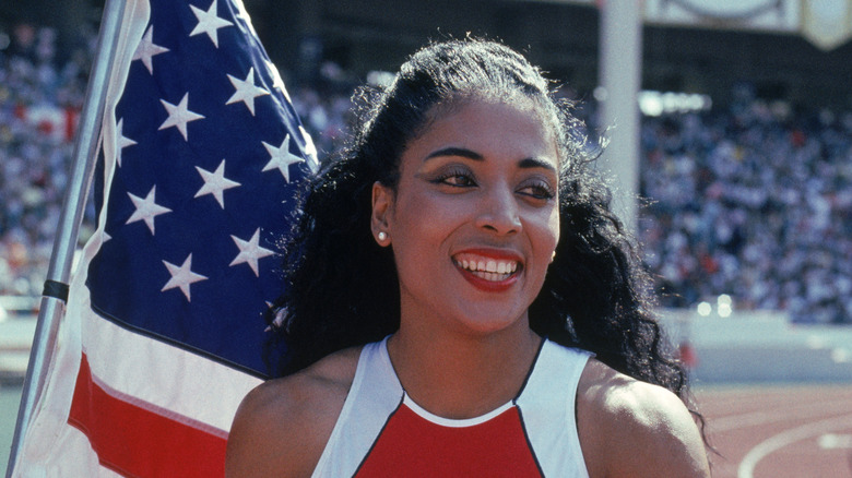 Flo Jo with American flag at Seoul Olympics