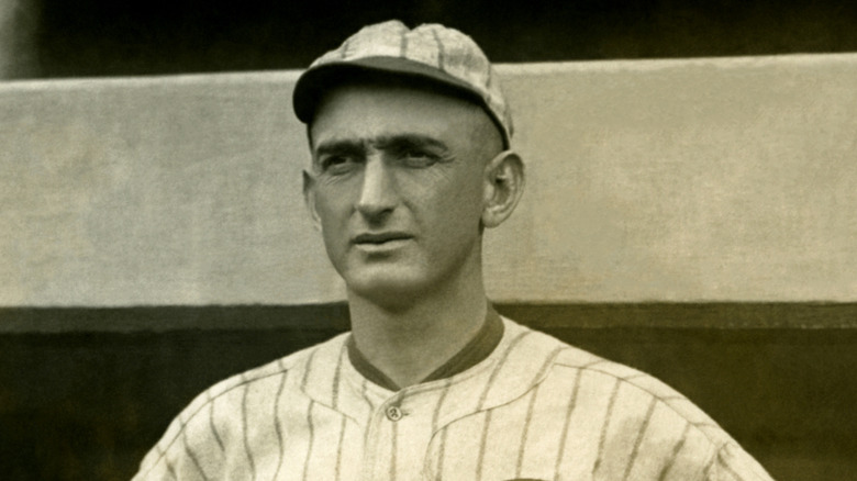 Shoeless Joe Jackson poses for picture in ballpark