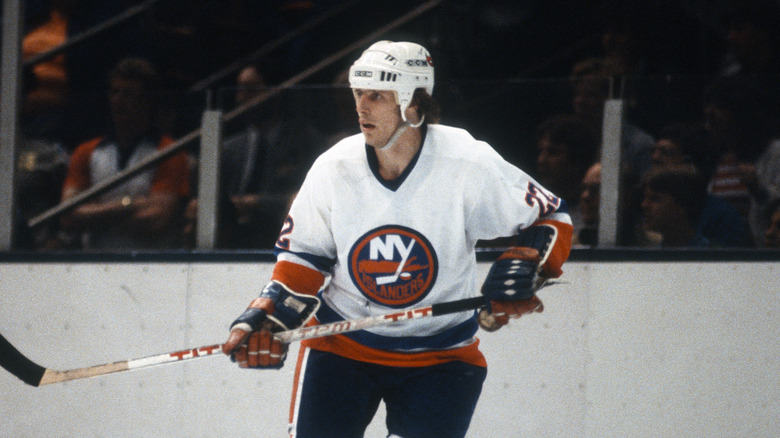 Mike Bossy ice skating uniform hockey stick