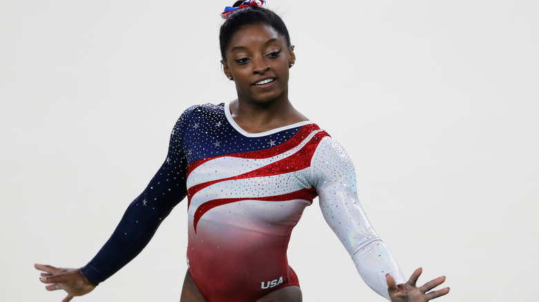 Simone Biles posing during floor event