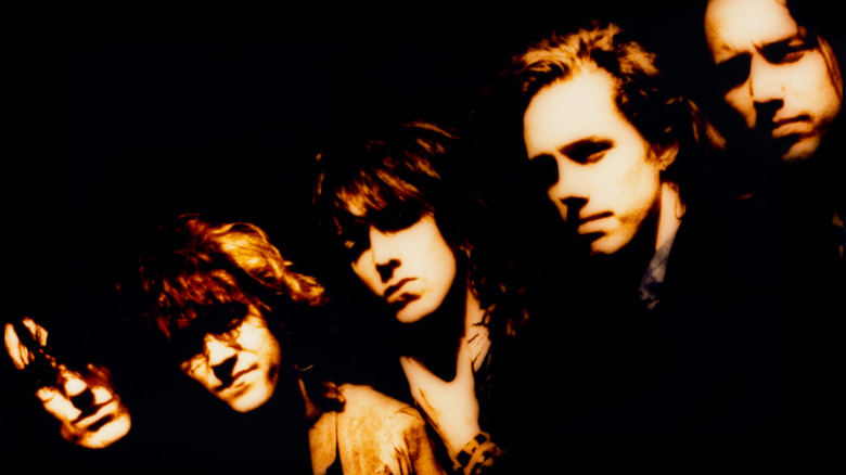 The Black Crowes posing for a 1990 portrait