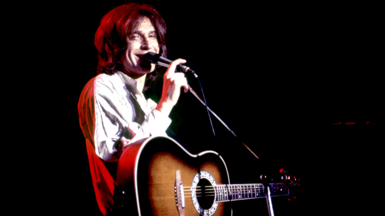 Ray Davies singing into microphone