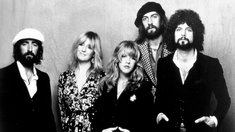 Black and white portrait of Fleetwood Mac, John McVie, Christine McVie, Stevie Nicks, Mick Fleetwood, and Lindsey Buckingham