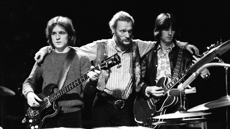 cream performing together on stage