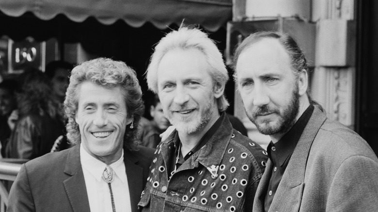 Roger Daltrey, John Entwistle, and Pete Townshend pose for portrait together, 1989
