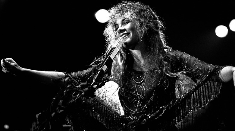 Stevie Nicks performing on stage