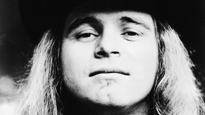 Close up black and white portrait of Ronnie Van Zant of lynyrd skynrd