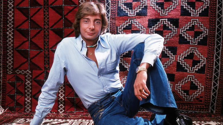 Barry Manilow lounging for photo