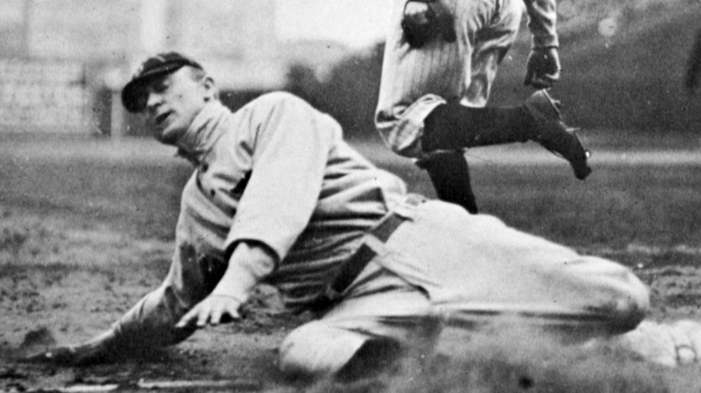 Ty Cobb stealing a base 