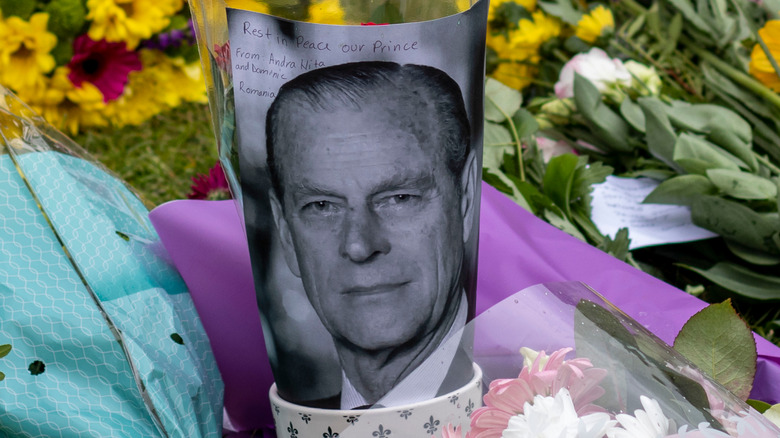 Bunches of flowers with Duke of Edinburgh's photo