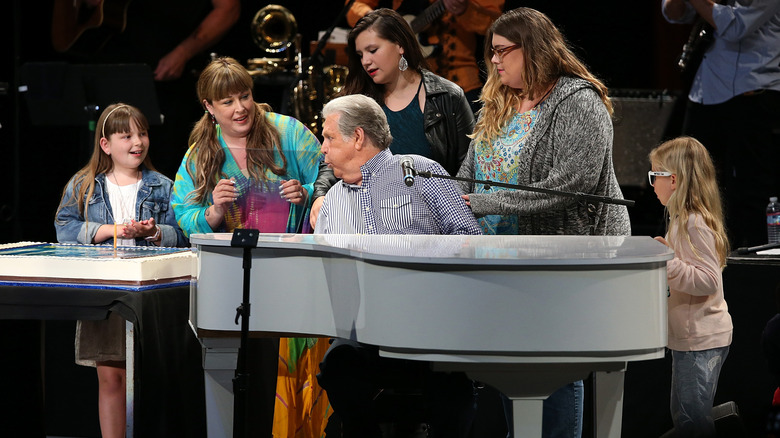 Brian Wilson and family on stage