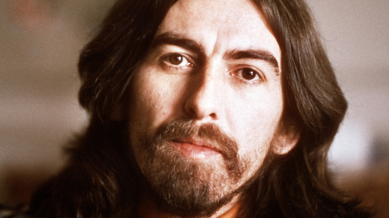 George Harrison looking thoughtful