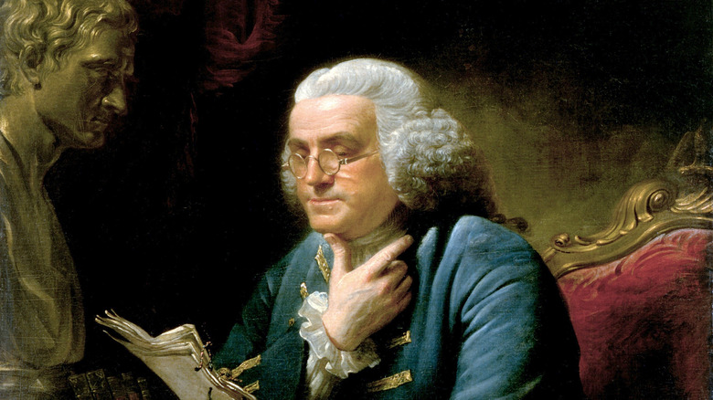 Benjamin Franklin reading in painting
