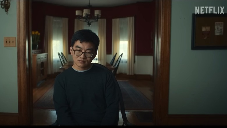 Danny Meng sitting at a table