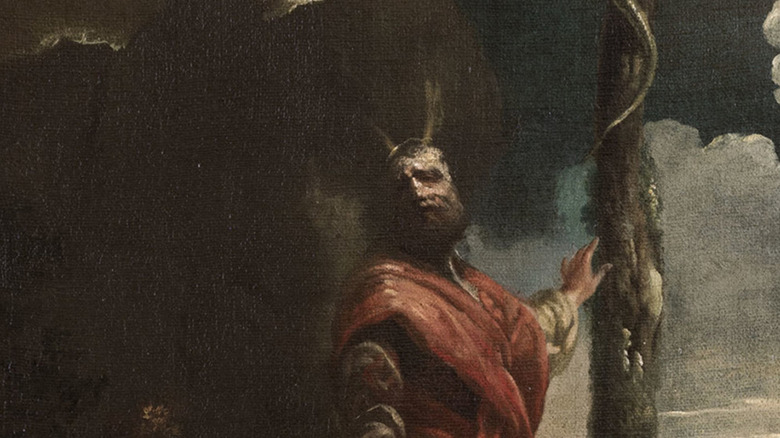 painting of Moses standing before a gathering storm