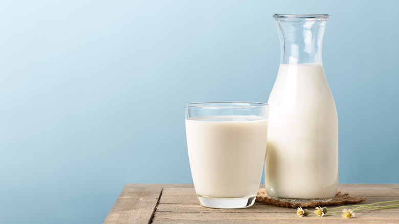 glass of milk on a table