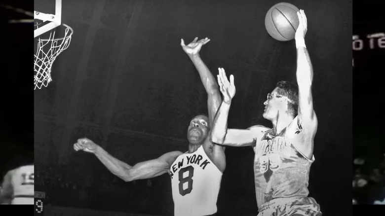 George Mikan doing a lay-up