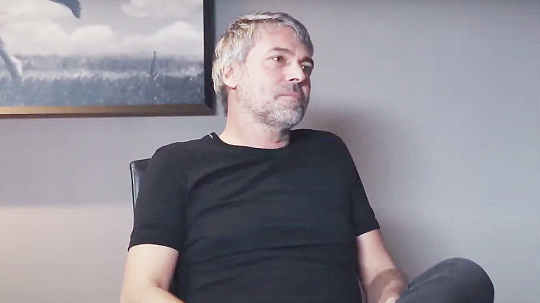 Petr Kellner seated in black T-shirt