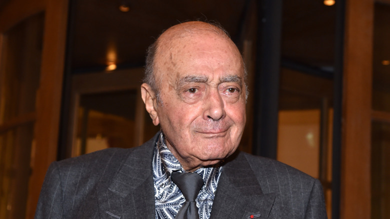 Mohamed Al-Fayed exiting a building