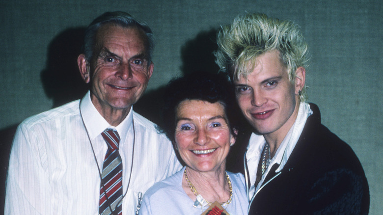 Billy Idol and his parents smiling at camera