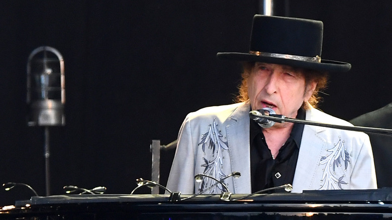 Bob Dylan singing onstage in 2023