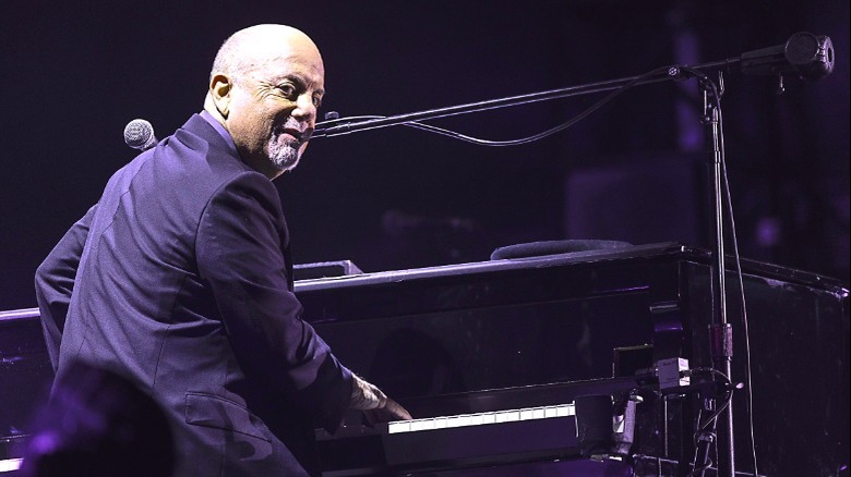 Billy Joel playing the piano