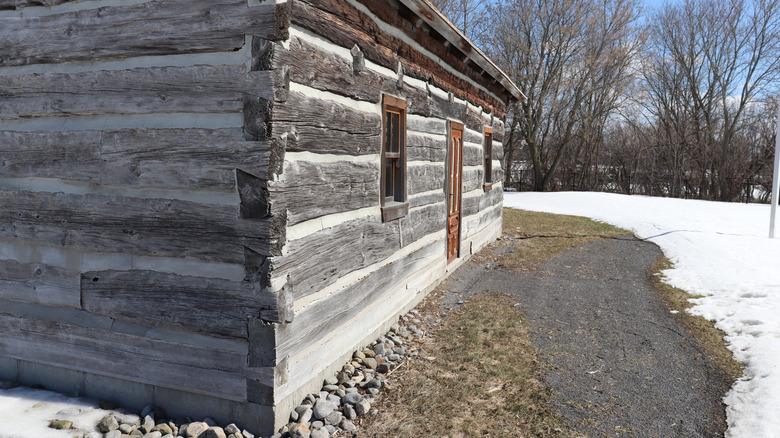 A colonial cabin in the snow