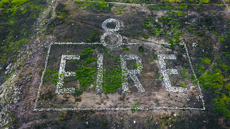 The refurbished 8 EIRE sign on a cliff