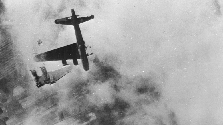 B17 Flying Fortress with its wing shot off during WWII