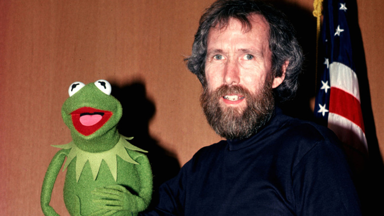 Jim Henson holding Kermit the Frog