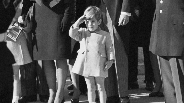John F. Kennedy Jr. salutes father's coffin