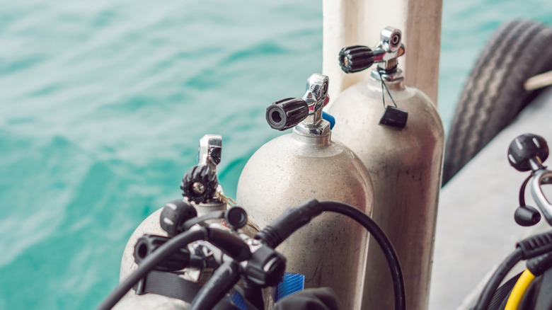 stock image of scuba tanks on a boat