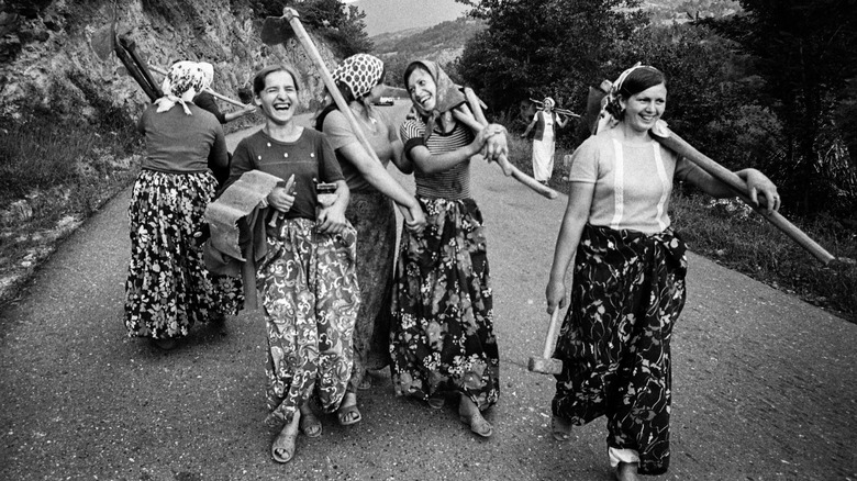 smiling women after outdoor work in montenegro, then in yugoslavia