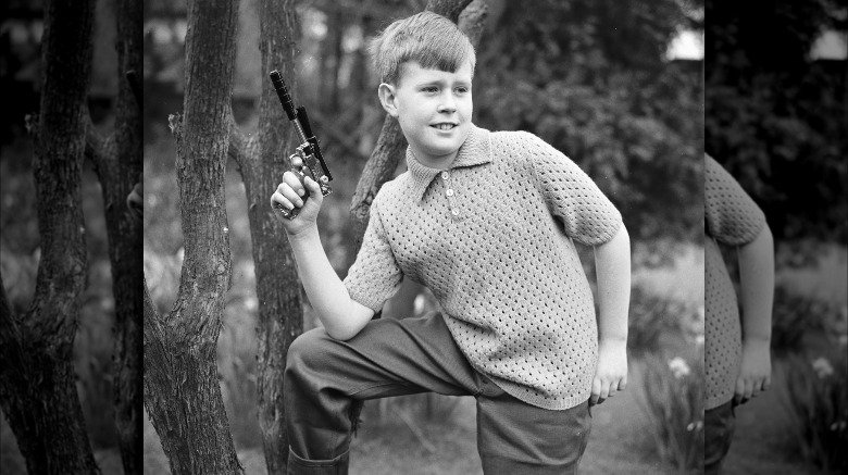 Boy with toy gun