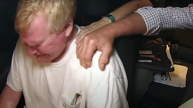 murdaugh weeps in police car