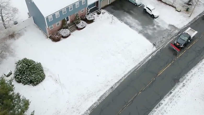 Aerial view of Brian Albert's house, driveway, and front yard