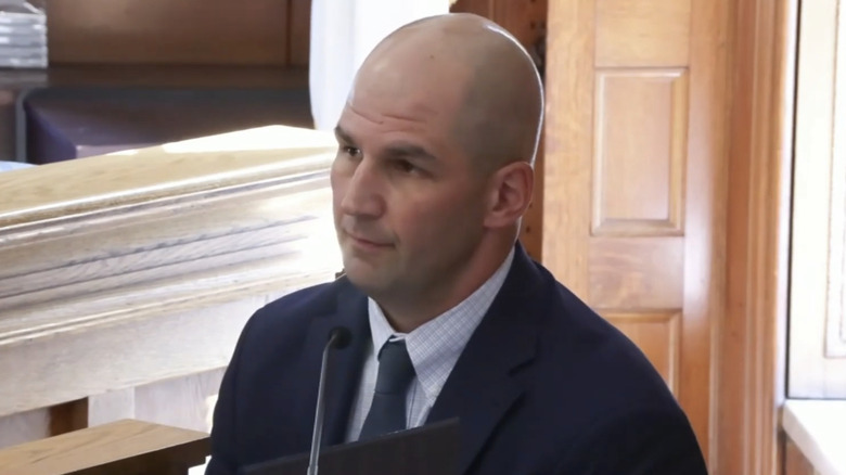 Michael Proctor testifying on stand in 2025 trial