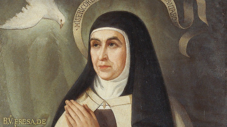Painting of Saint Teresa of Avila dove hands clasped