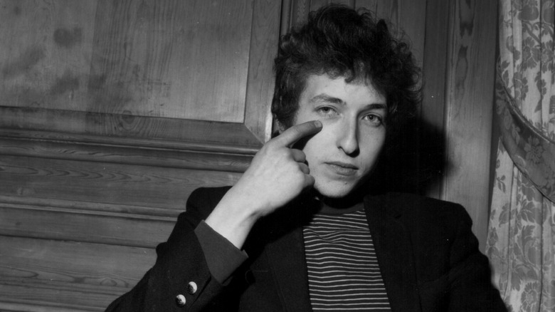Bob Dylan pointing at eye