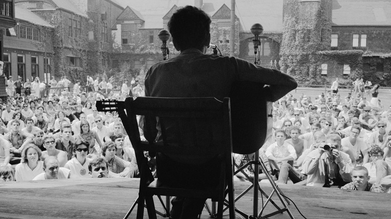 Bob Dylan playing to music festival crowd