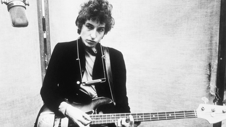 Bob Dylan in studio with guitar