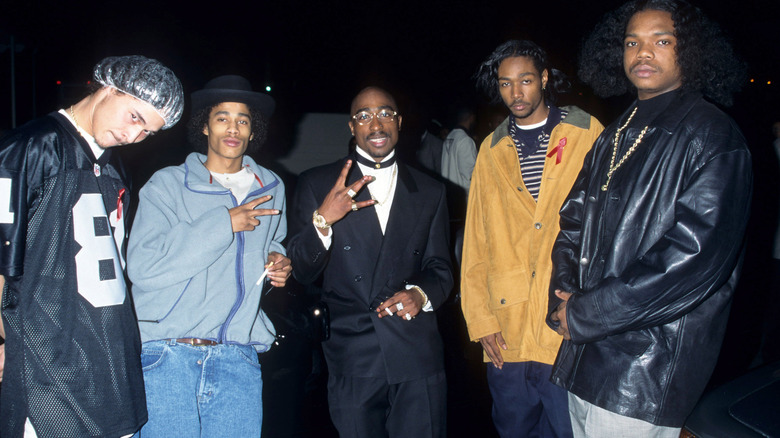 Bone Thugs and Tupac Shakur hand signs