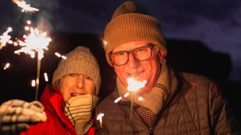 A couple with sparklers Bonfire Night