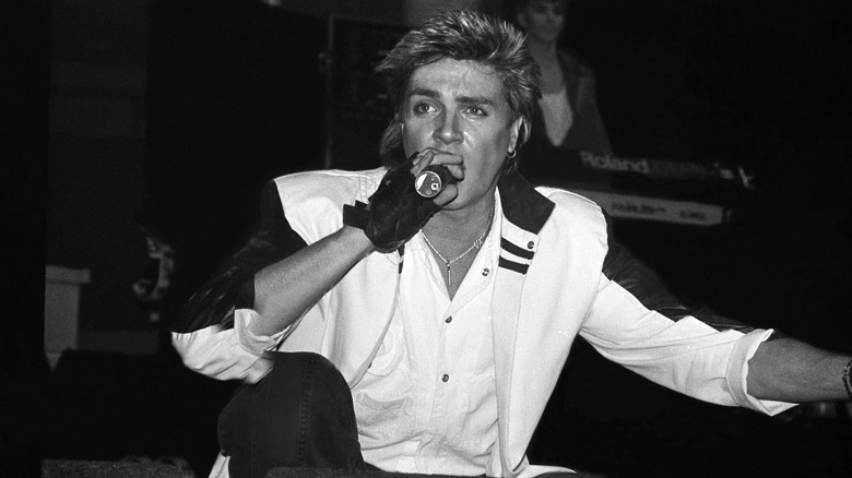 Simon Le Bon performing with Duran Duran on stage