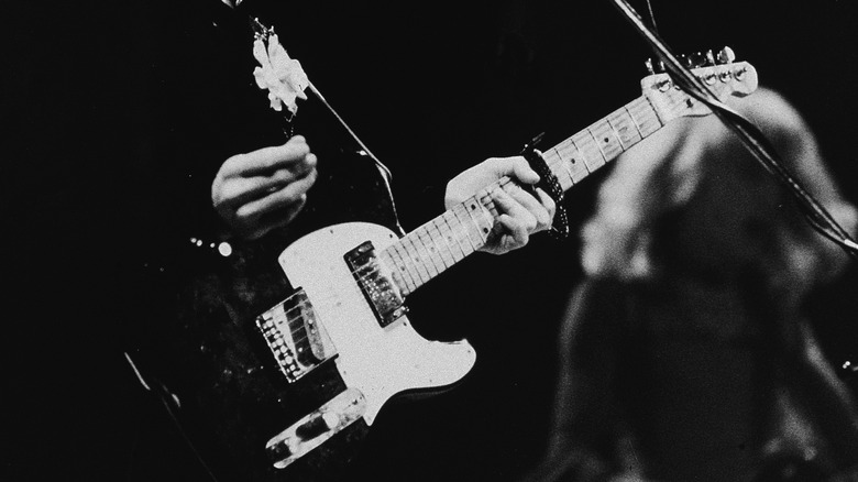 John Lennon holding Telecaster