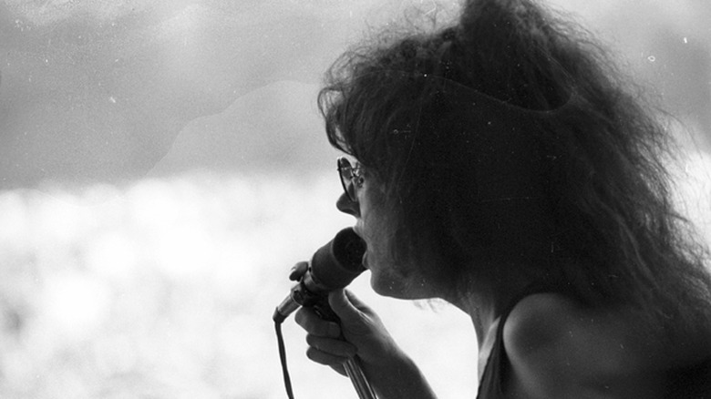 Grace Slick performing on stage.
