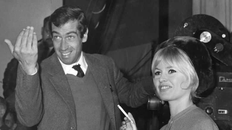 Brigitte Bardot and Roger Vadim smiling