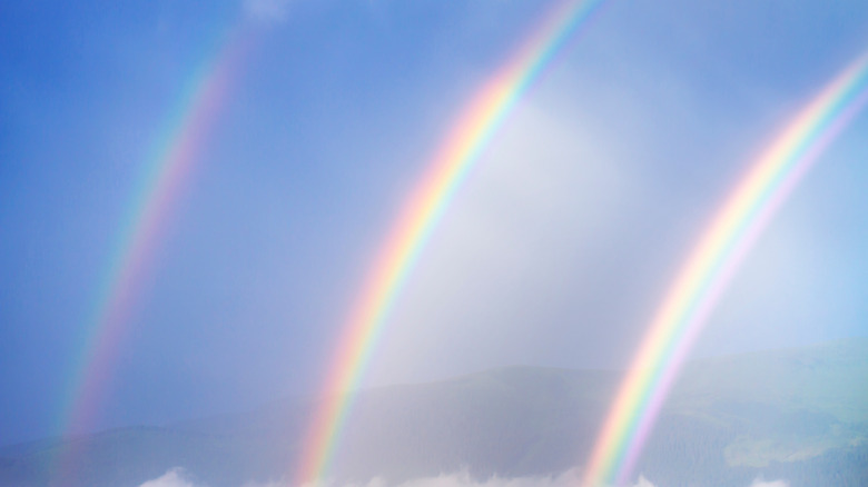 Triple rainbow across the sky